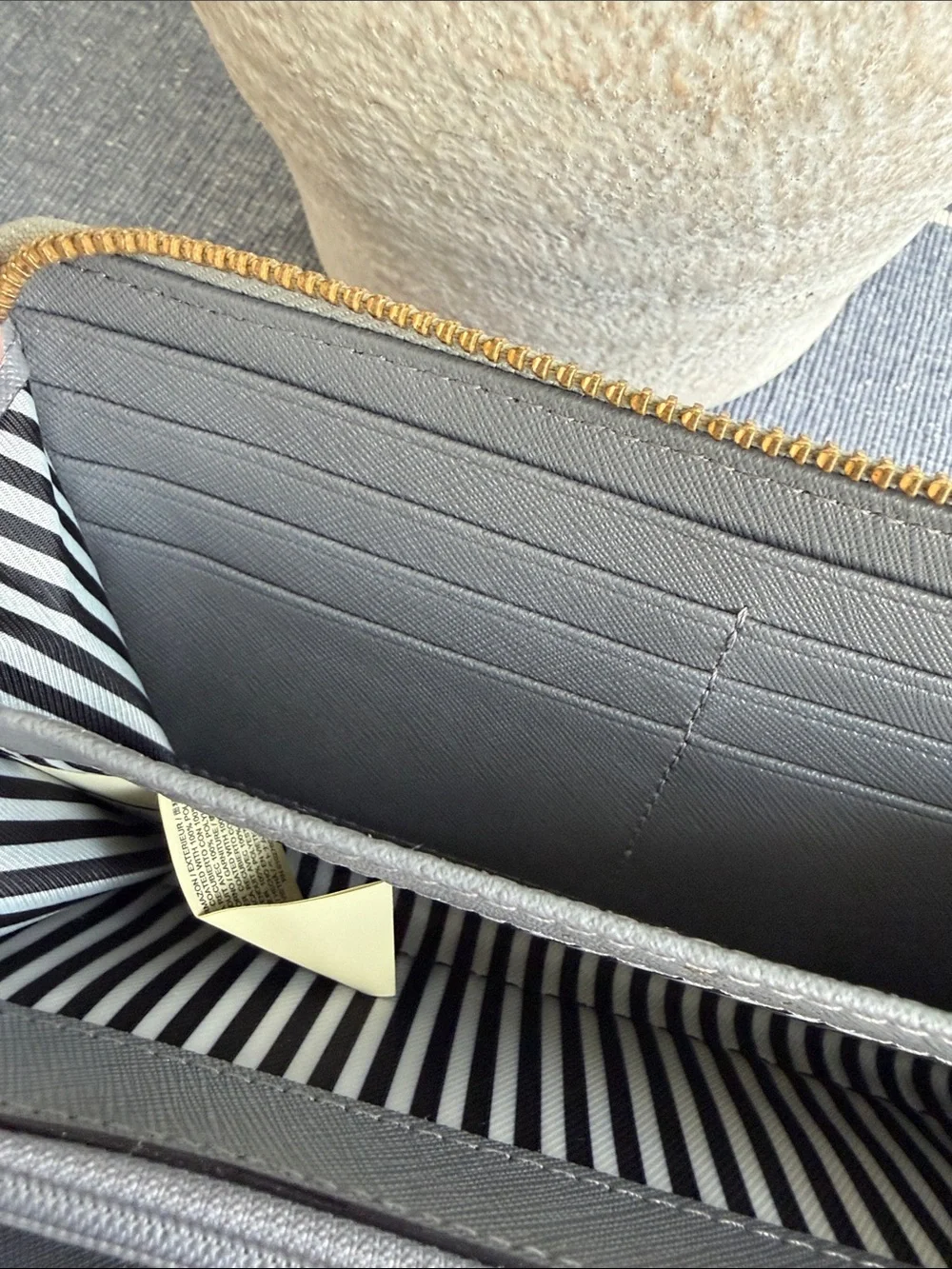 Kate Spade Two-Tone Gray Zip Around Wallet with Gold Hardware